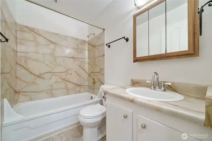 Fresh full bathroom with updated fixtures.