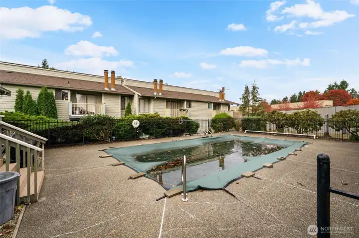 Spacious pool area for lounging in the sun.