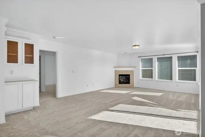 Cabinets for storage or office area. Primary bedroom through door.