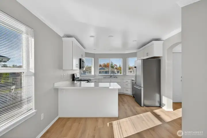 Looking into the kitchen from the dining area.