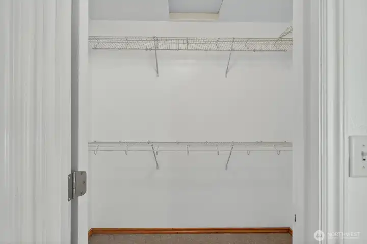 Primary walk-in closet.