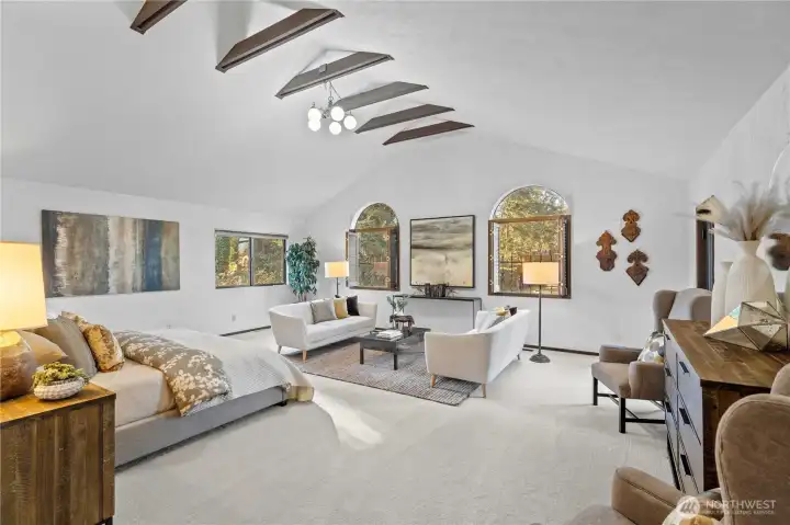 Guest bedroom retreat has an enormous walk-in closet and access to the deck.