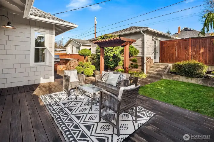 The back deck has a built in gas BBQ. The whole yard is on sprinklers and a drip watering system.