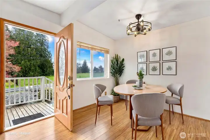 Dining area virtually staged.