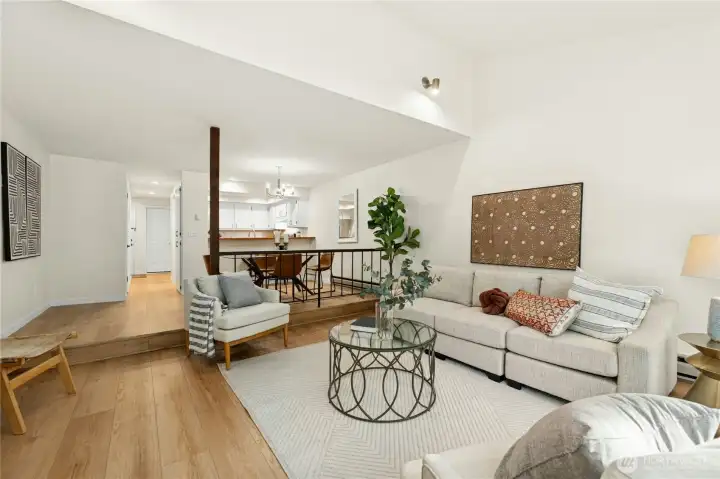 Living area with vaulted ceilings.