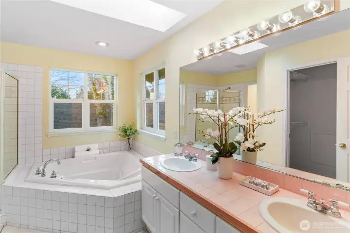 Shower, soaking tub, water closet, His & Hers basins, and walk-in clothes closet...