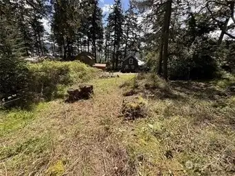 This .22 acre parcel is ready to build with Eastsound Water User's membership in place and electric to the property line.