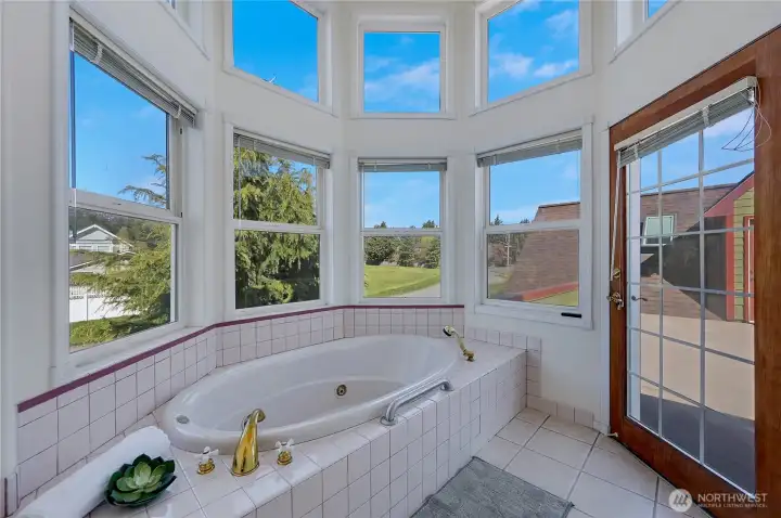 Primary spa room. Jetted tub, walk-in closet, and second-floor private deck.