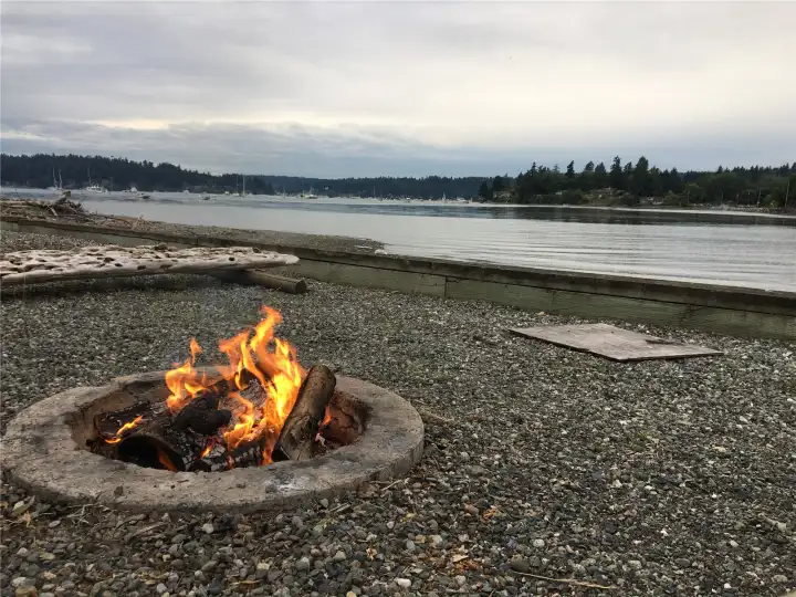 The beachfront fire pit is ready for roasting s'mores, watching Vashon's famous fireworks show, or as the centerpiece for conversation year round.