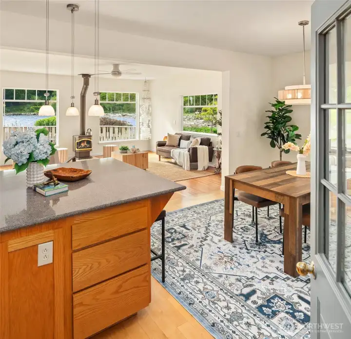 Enter into the kitchen and dining areas with huge island for gathering around.