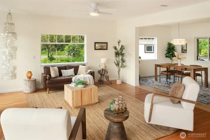 Fresh paint, new light fixtures, double pane windows and the perfect amount of separation between living and dining rooms.