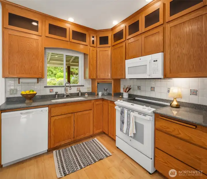Kitchen is set up to easily cook for a crowd with tons of storage and ample counter space.