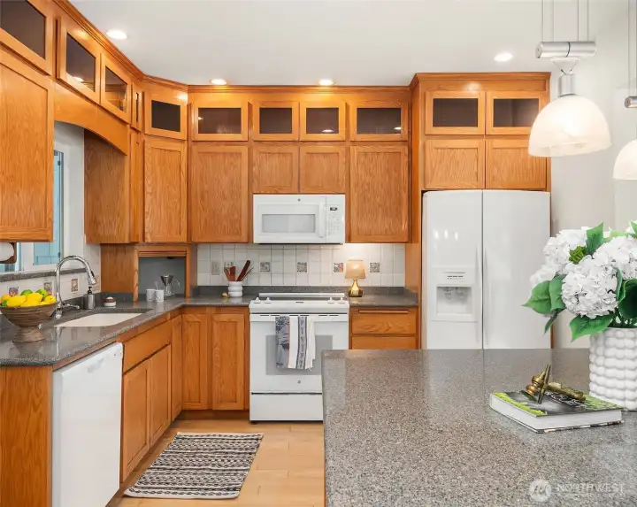 Stone counter tops and custom tile backsplash.