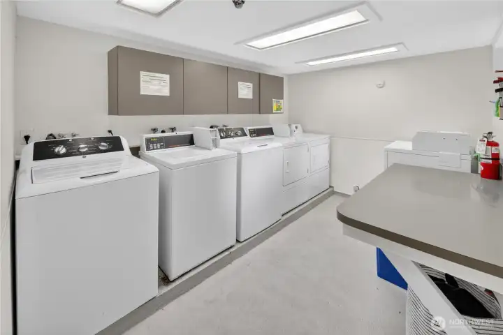 Free on-site laundry for all residents, a rare and appreciated perk in Seattle condo living. Three full-size washers and three dryers mean no quarters, no laundromats, no hassle.