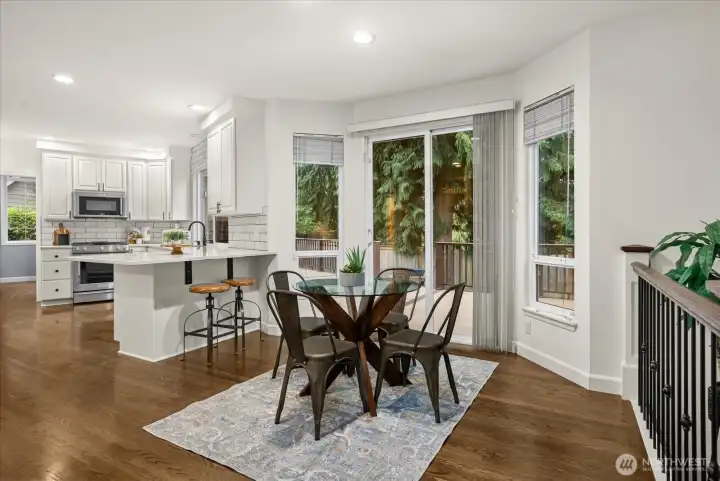 Breakfast nook with slider for access to large trex deck