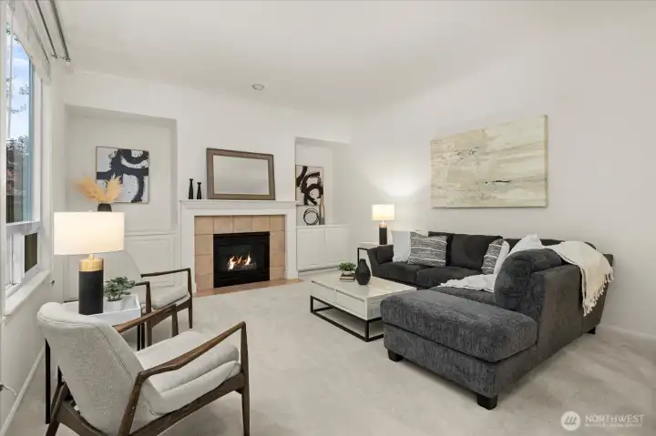 Great family room with cozy gas fire, plenty of storage, and in the heart of the home!