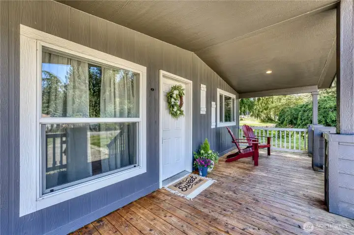 Spacious front porch with room to lounge! Spacious front porch with room to lounge!