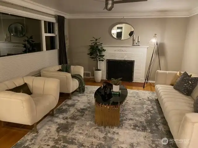 Front room featuring a wood burning fireplace Front room featuring a wood burning fireplace