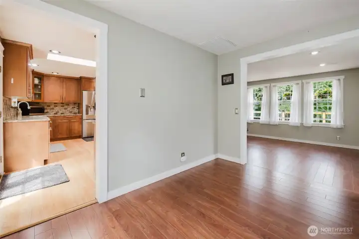 Dining room situated between the kitchen and lviing room.
