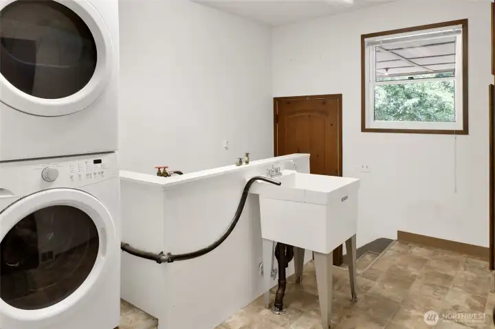 Washer dryer and mud room off carpoet Washer dryer and mud room off carpoet