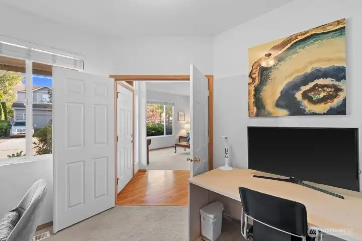 These double doors open right off the entry to an office/den.