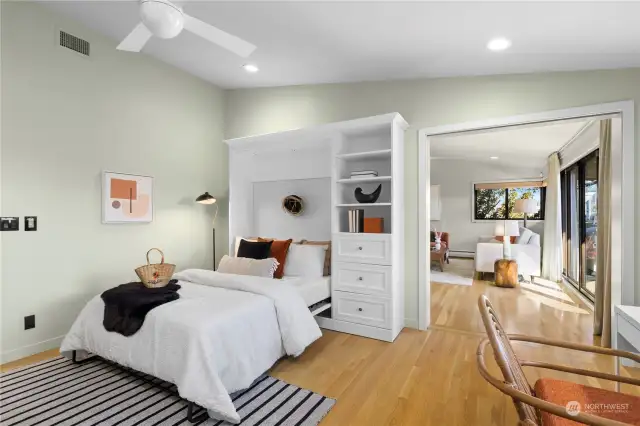 Bedroom/flex space with built-in Murphy bed, perfect for guests or working from home.