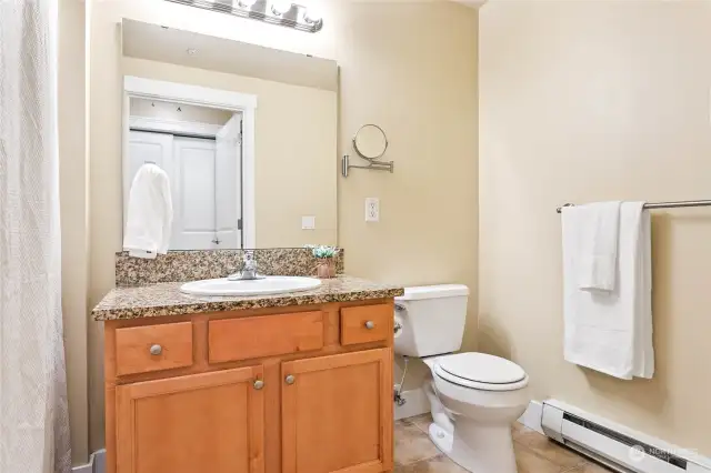 Clean and bright full bathroom.