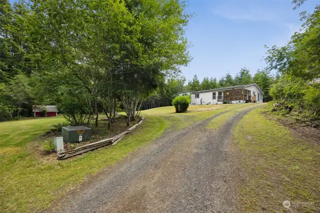 Experience the best of country living with this charming property. Long driveway provides peaceful setting, setting the home back from the road for added privacy.