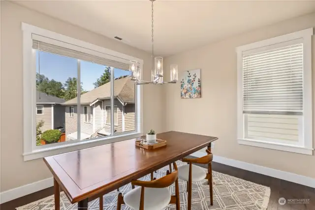 The spacious Dining Area gets SE light exposure and the bright millwork frame the windows perfectly!