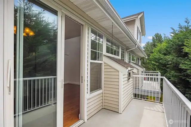 The upstairs balcony is just off of the main living and dining area.