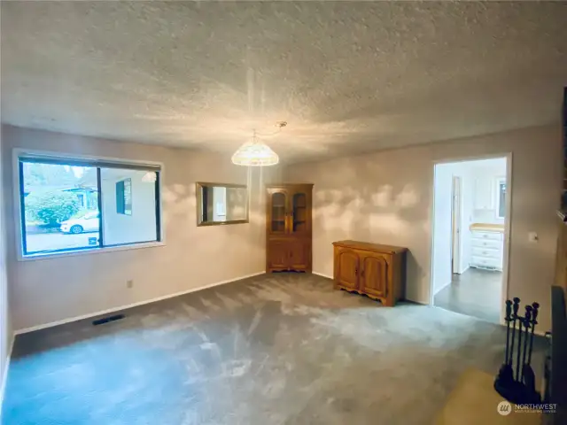 Formal dining room connecting to kitchen makes entertaining a breeze!