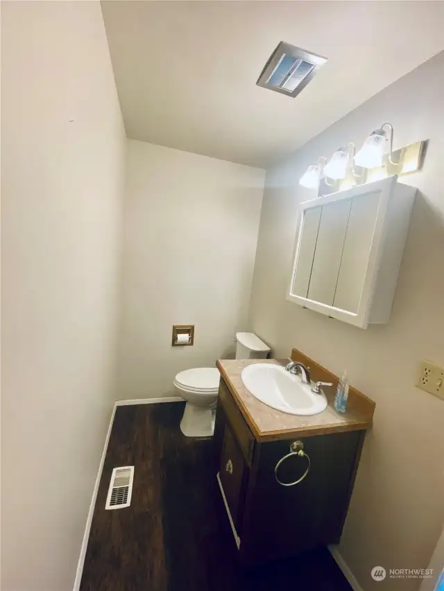 Guest bathroom off of kitchen.