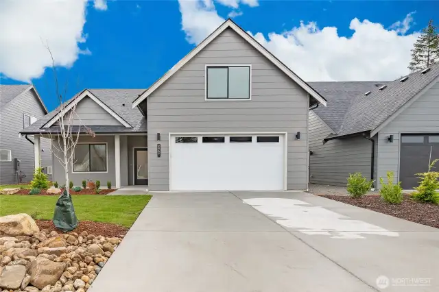 Photos shown are of a similar floor plan previously built in a different neighborhood (The Ridge in Blaine). Finishes and features may vary. Some items pictured reflect buyer-selected upgrades which are not included in the base price and may be added at an additional cost.