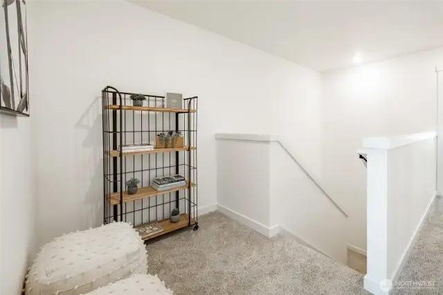 Photos shown are of a similar floor plan previously built in a different neighborhood (The Ridge in Blaine). Finishes and features may vary. Some items pictured reflect buyer-selected upgrades which are not included in the base price and may be added at an additional cost.