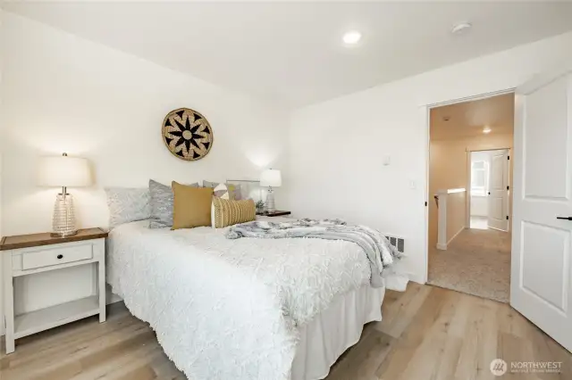 Photos shown are of a similar floor plan previously built in a different neighborhood (The Ridge in Blaine). Finishes and features may vary. Some items pictured reflect buyer-selected upgrades which are not included in the base price and may be added at an additional cost.