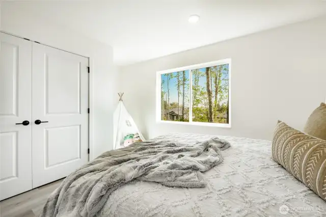 Photos shown are of a similar floor plan previously built in a different neighborhood (The Ridge in Blaine). Finishes and features may vary. Some items pictured reflect buyer-selected upgrades which are not included in the base price and may be added at an additional cost.