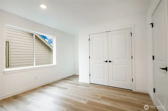 Photos shown are of a similar floor plan previously built in a different neighborhood (The Ridge in Blaine). Finishes and features may vary. Some items pictured reflect buyer-selected upgrades which are not included in the base price and may be added at an additional cost.