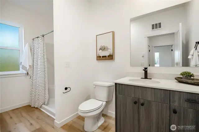 Photos shown are of a similar floor plan previously built in a different neighborhood (The Ridge in Blaine). Finishes and features may vary. Some items pictured reflect buyer-selected upgrades which are not included in the base price and may be added at an additional cost.