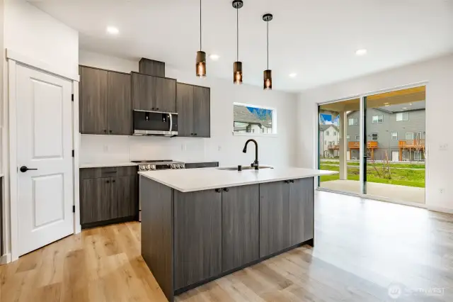 Photos shown are of a similar floor plan previously built in a different neighborhood (The Ridge in Blaine). Finishes and features may vary. Some items pictured reflect buyer-selected upgrades which are not included in the base price and may be added at an additional cost.