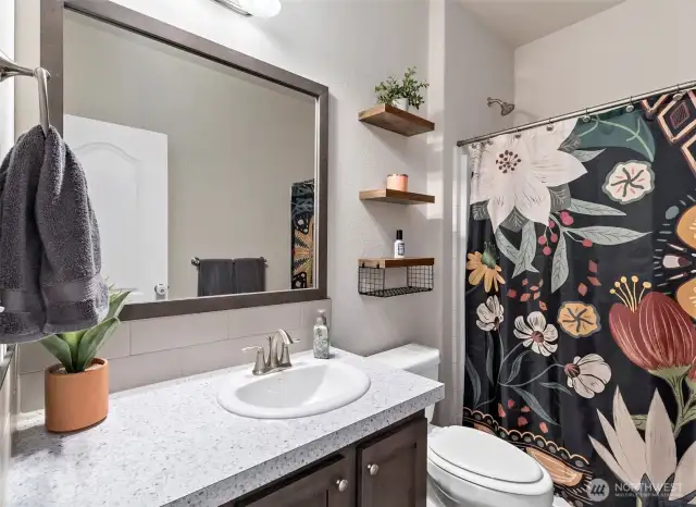 Large laundry room. With door leading to backyard.