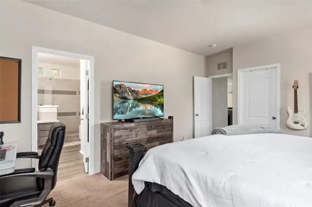 Primary bedroom with walk-in closet.