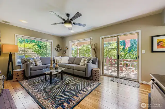 Living room with connecting S facing entertainment size deck