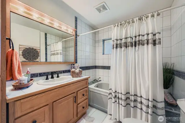 Updated main floor full bath with soaking tub