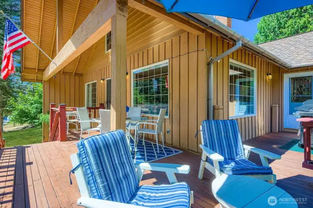 Wrap around deck connects to both living room and dining room