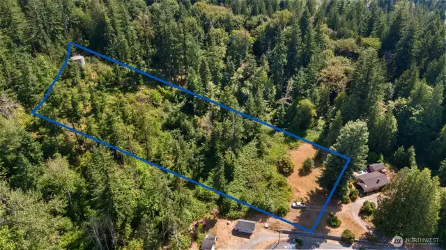 Upper 2.6 acres separated by neighbor's property (accessed by easement) - listing agent will and lot boundary questions.