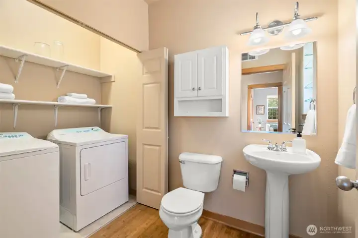 Main floor laundry and half bath.