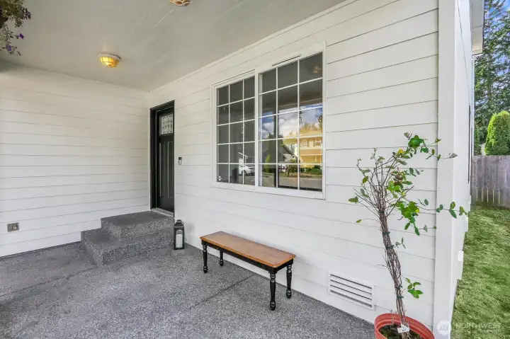 Inviting covered entry, perfect for welcoming guests and enjoying year-round.