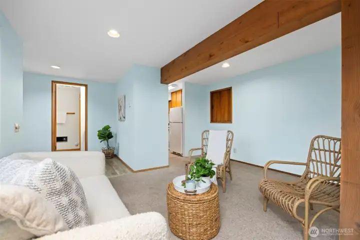 Looking across the living area toward the bath and the kitchen.