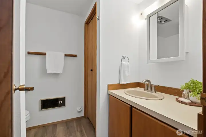 There is a full bath in the apartment as well as a linen storage closet.