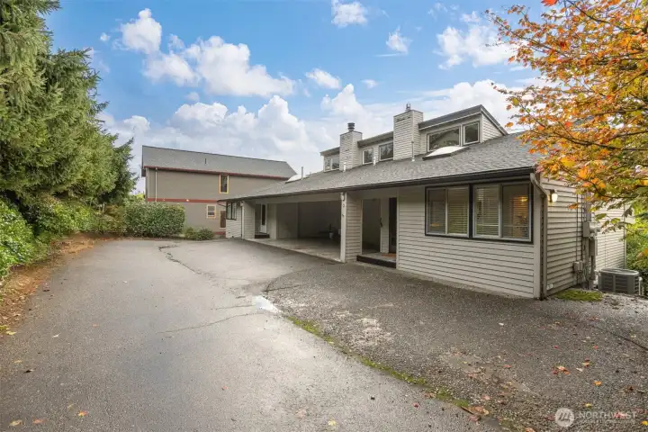 There are two parking spaces in the carport of this northeast end condo unit.